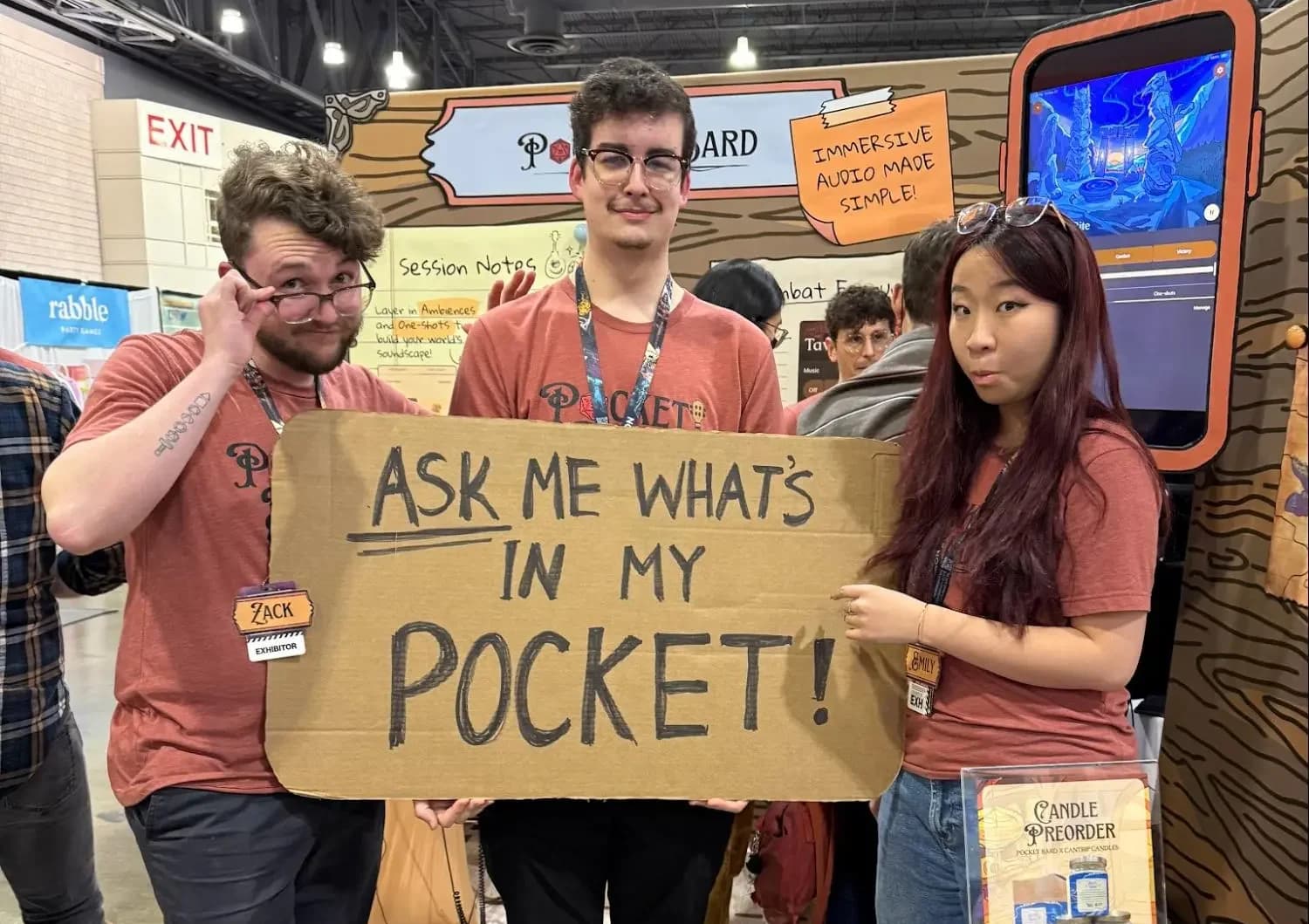 Zack, Austin, and Emily at the Pocket Bard booth at PAX Unplugged 2025