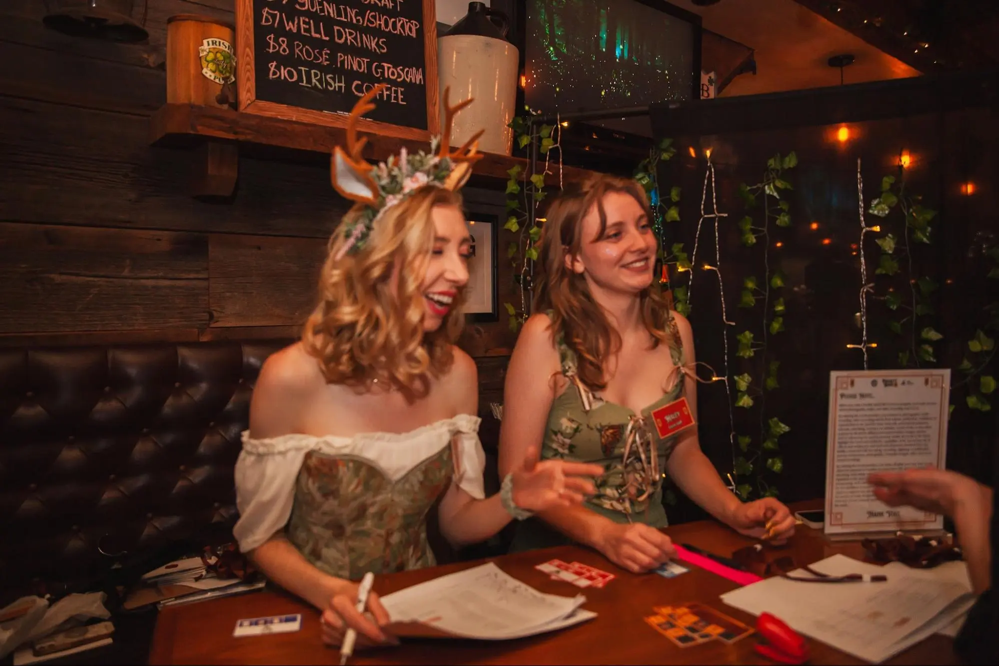 Jeanette and Hailey welcoming guests at Pocket Bard’s Tavern Launch Event, 2024