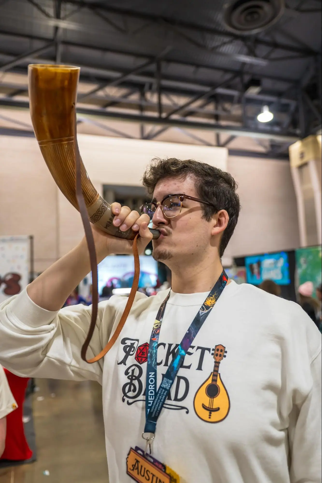 Austin sounding the horn at Pax Unplugged 2025
